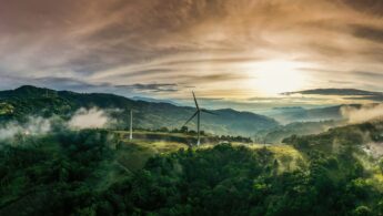 Colorful sunrise and wind turbines in Cartago, Costa Rica.